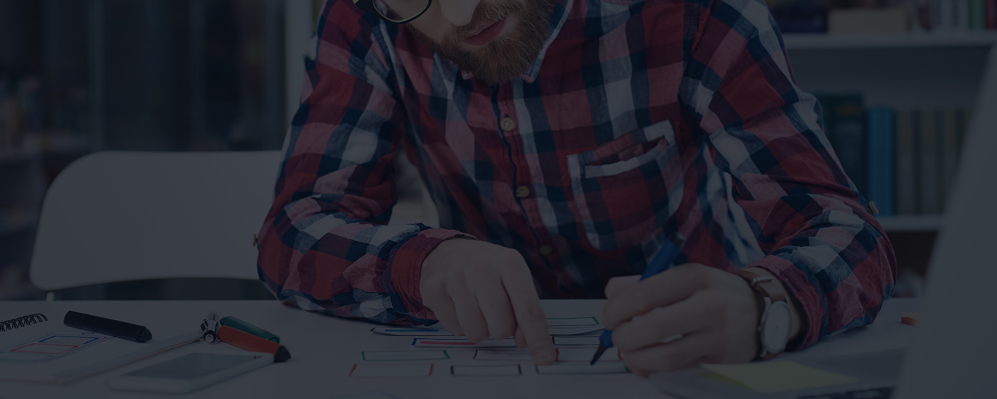 Person Designing on Paper Person Designing on Paper